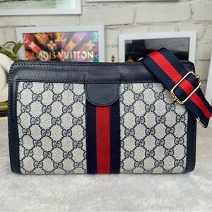 Gucci GG Sherryline Monogram Interlocking Web Supreme Ophidia crossbody clutch